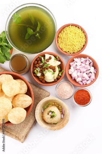 Panipuri or Golgappa is a popular street snack from India. It's a round, hollow puri filled with a mixture of flavoured water and other chat items