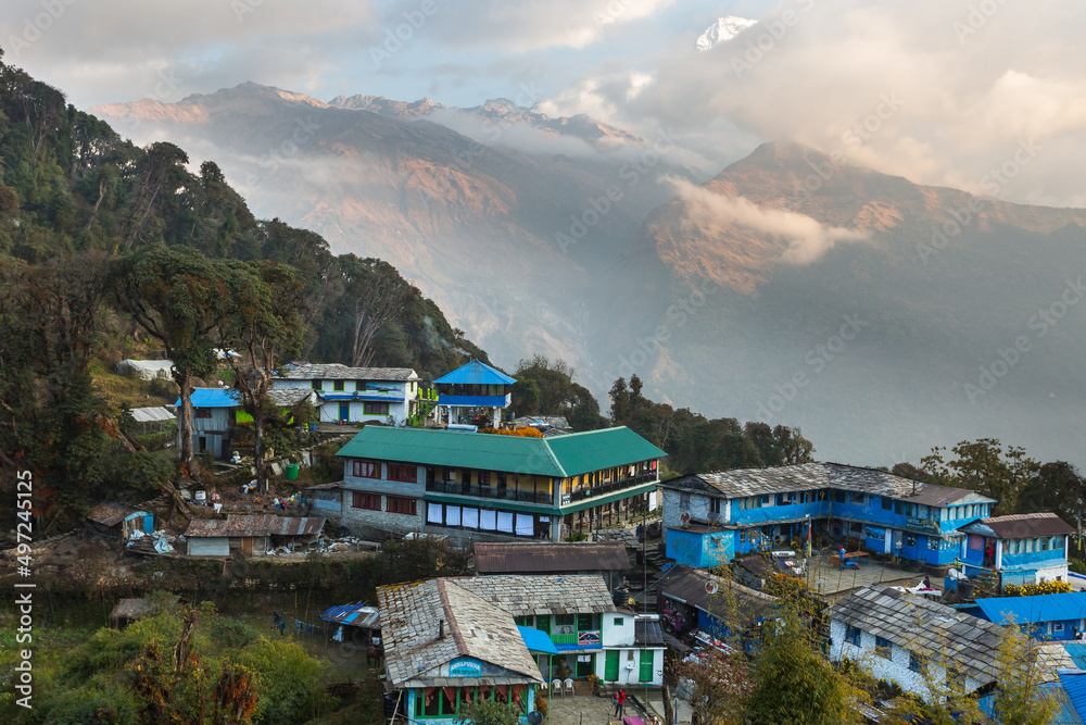  Hikers in small village Tadapani, Annapurna Conservation Area, Himalaya, Nepal