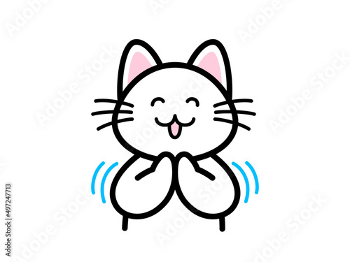 笑顔で拍手をする猫