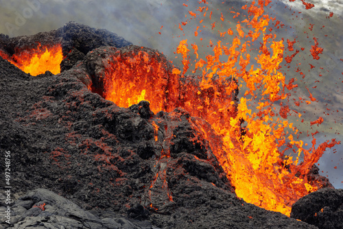 Fotografie Red lava spitted from crater