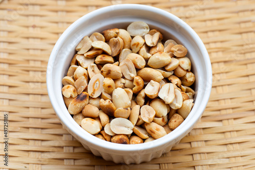 Roasted peanuts in white cup