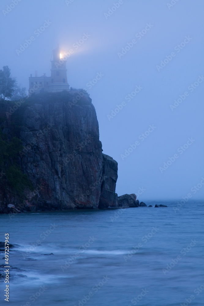 Split Rock Lighthouse On A Foggy Evening On Lake Superior
