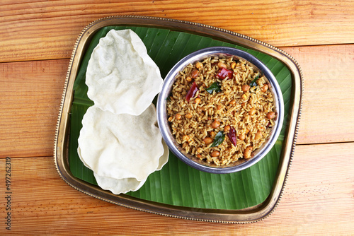 Temple Puliyodharai / Puliyogare / Tamarind Rice - Tangy and spicy South Indian rice,Tamarind rice served in temples as prasadam in temples photo