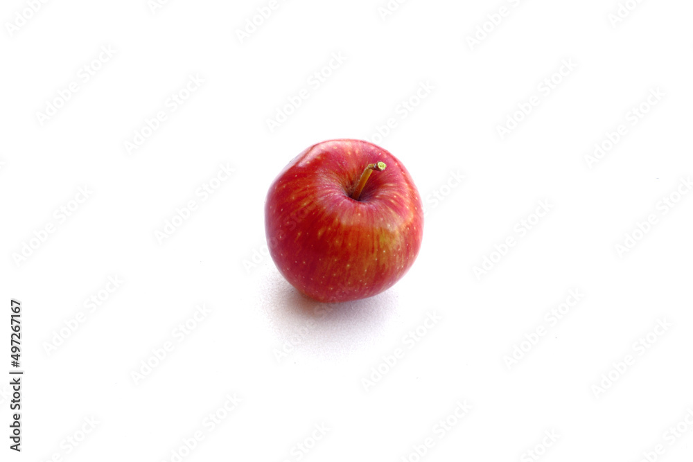 Red apple isolated on white background. Ripe red apple on a white background. Red apple in natural light. Red apple isolated on white background. Ripe red apple on a white background. Red apple in natural light.