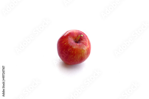 Red apple isolated on white background. Ripe red apple on a white background. Red apple in natural light.