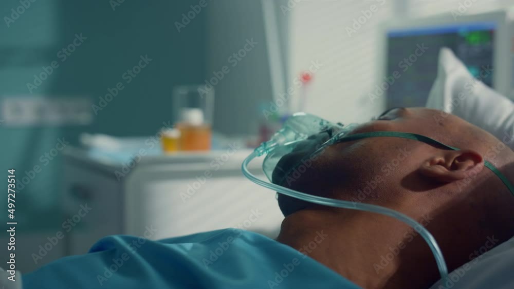 Doctor take tubes covid19 for clinic test. Patient lie in oxygen mask closeup