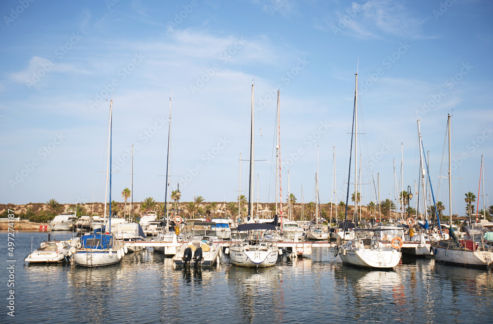 Docked ships at marine bay in a Spanish town. High-quality photo