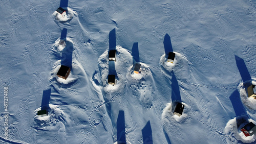 Lot of cabins for ice fishing on the frozen St-Laurence River in Rimouski, Quebec, Canada photo