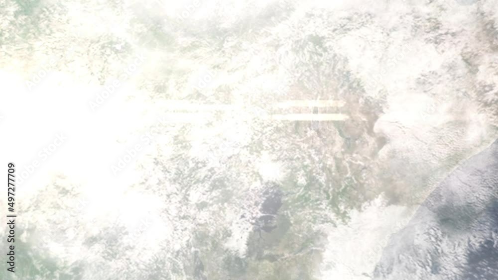 Earth zoom in from outer space to city. Zooming on Gulu, Uganda. The animation continues by zoom out through clouds and atmosphere into space. Images from NASA