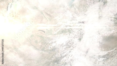 Wallpaper Mural Earth zoom in from outer space to city. Zooming on Kokand, Uzbekistan. The animation continues by zoom out through clouds and atmosphere into space. Images from NASA Torontodigital.ca