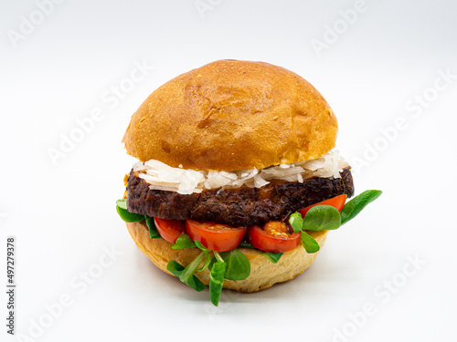 Juicy hamburger on white background photo