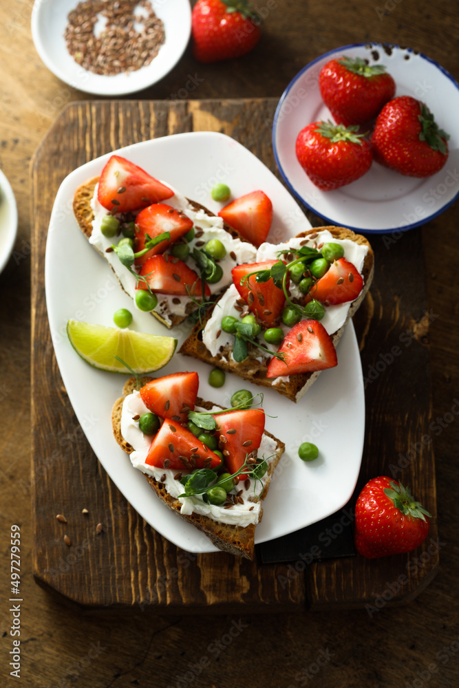 Homemade strawberry bruschetta with green pea Homemade strawberry bruschetta with green pea