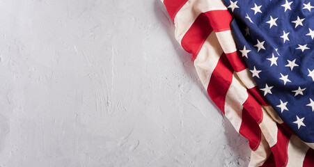 Happy Memorial day concept made from american flag on white stone background.