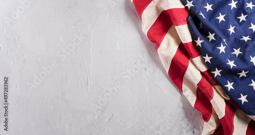 Happy Memorial day concept made from american flag on white stone background.