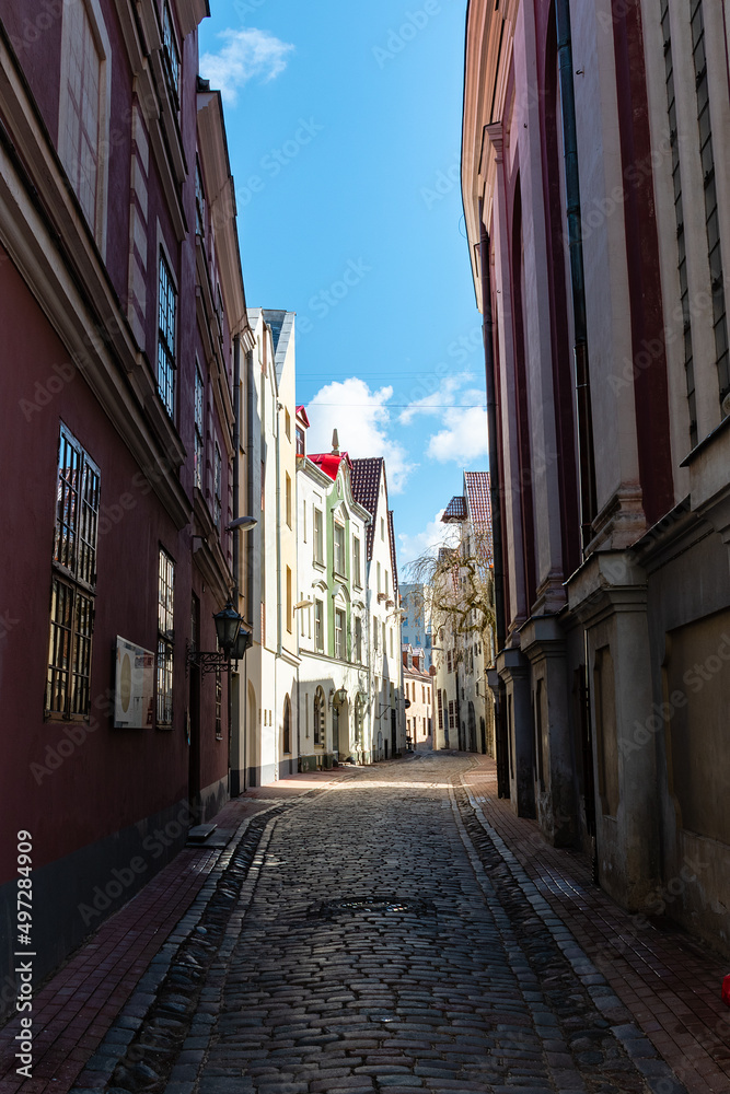 Narrow cobblestone street in The Old Town Riga, Latvia in spring