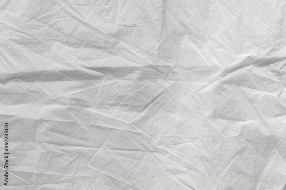 Fototapeta premium Close up of a white plastic incontinence pad texture background.