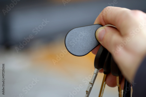 Electronic key fob in hand