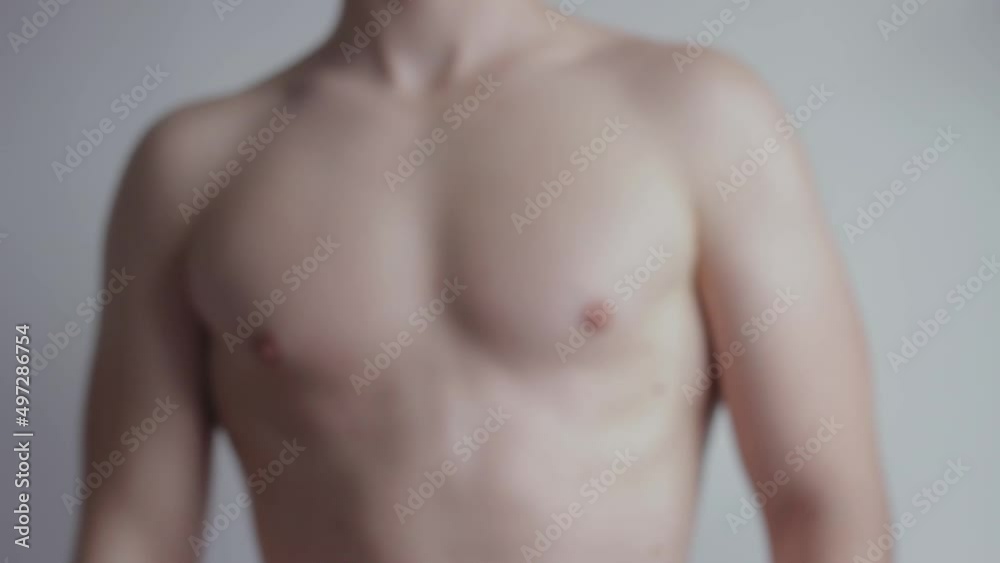 Body Health Inspection Of A Young Caucasian Man At Hospital. Body Health Inspection Of A Young Caucasian Man At Hospital.