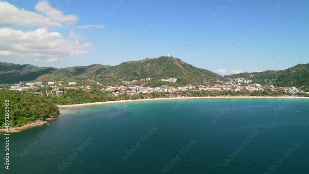 Beautiful landscape coastline of tropical white sand Karon beach in Phuket Thailand on a summer sunny day around the blue andaman sea. Beautiful landscape coastline of tropical white sand Karon beach in Phuket Thailand on a summer sunny day around the blue andaman sea.