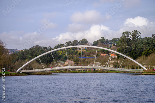 Pedestrian bridge over the Lerez river, which forms the Ria de Pontevedra, one of the estuaries that forms the Rias Bajas in Galicia (Spain)
