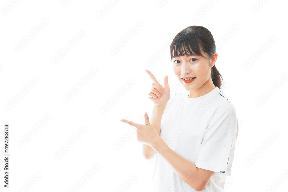 体操服で指をさす若い女子学生 体操服で指をさす若い女子学生