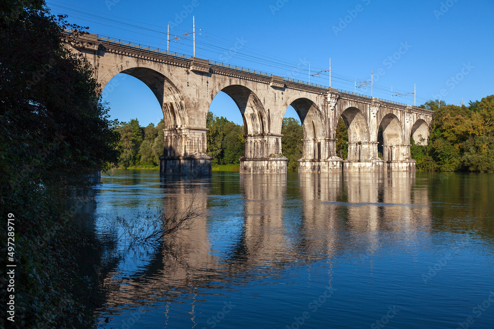 Train stone bridge over river Isonzo Gorizia Italy