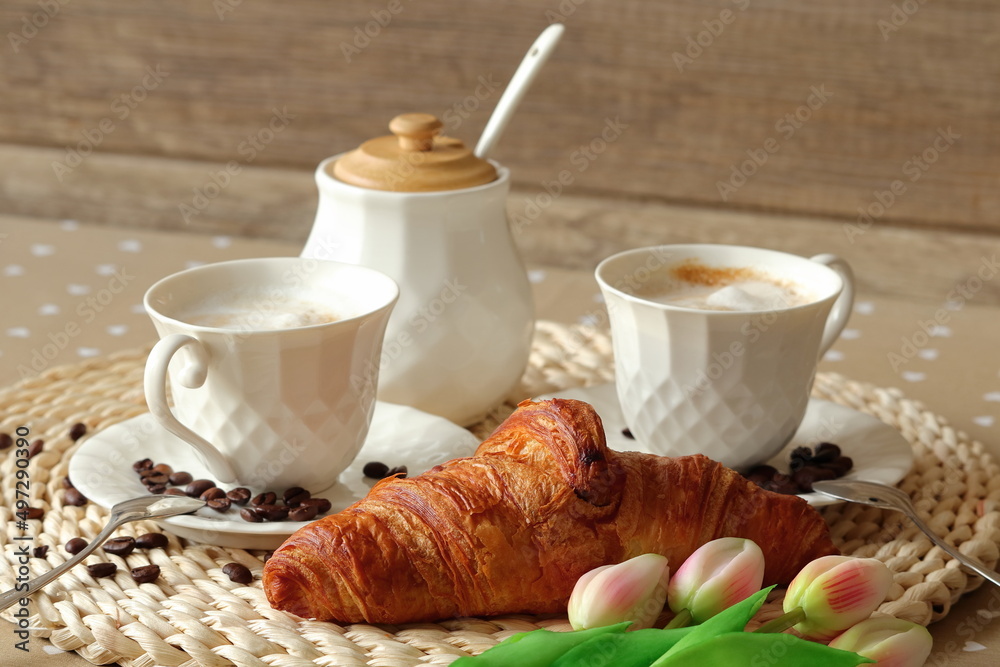 Kawa. Poranna kawa z rogalikiem. Coffee. Morning coffee with a croissant. - obrazy, fototapety, plakaty 