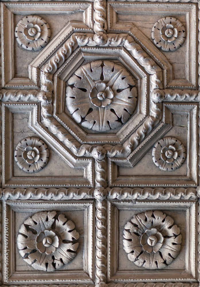 Ancient door ornaments on the Cividale del Friuli Cathedral Italy