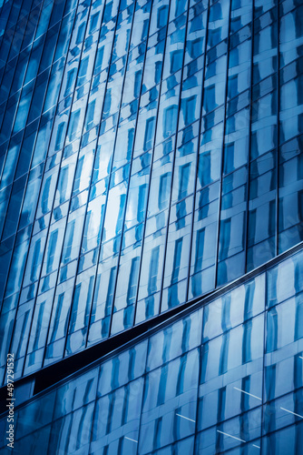 Modern building facade. Light reflection in modern office building.