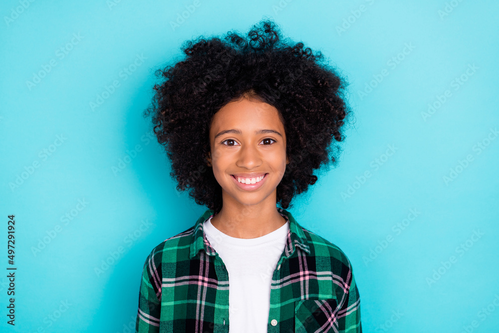 Photo of pretty cheerful candid schoolgirl shiny beaming smile wear plaid shirt isolated turquoise color background Photo of pretty cheerful candid schoolgirl shiny beaming smile wear plaid shirt isolated turquoise color background