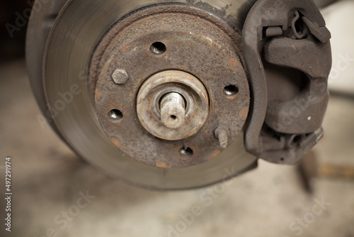 Close up Car brake part at garage, Old and dirty