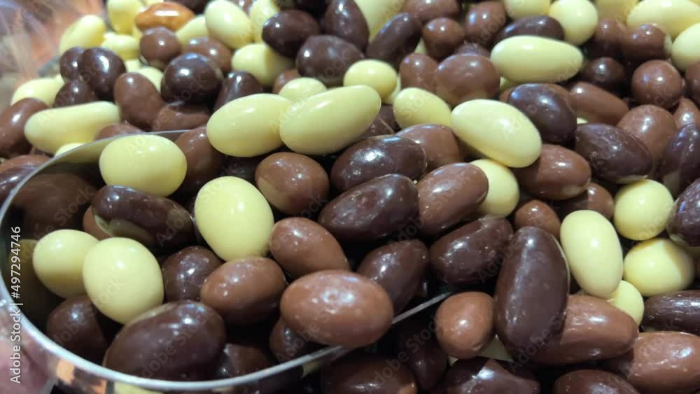 Nuts Different sweets on the counter are laid out all the colors of the rainbow as much as the saliva flows from jelly figurines to pasta and chocolate. High quality 4k footage Nuts Different sweets on the counter are laid out all the colors of the rainbow as much as the saliva flows from jelly figurines to pasta and chocolate. High quality 4k footage