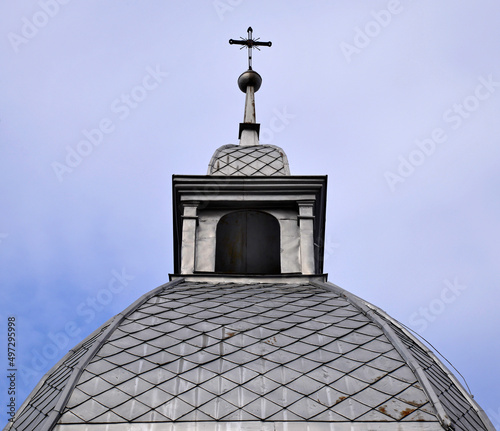 General view and architectural details of the chapel built in 1856 and the Catholic Church of the Blessed Virgin Mary in Kundzin in Podlasie, Poland.