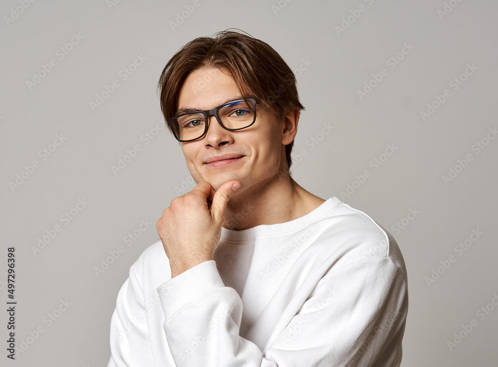 Portrait of young man wear glasses isolated over gray background Portrait of young man wear glasses isolated over gray background