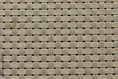 exture  and background of tablemat from plastic.weave pattern of tablemat from plastic.abstract.