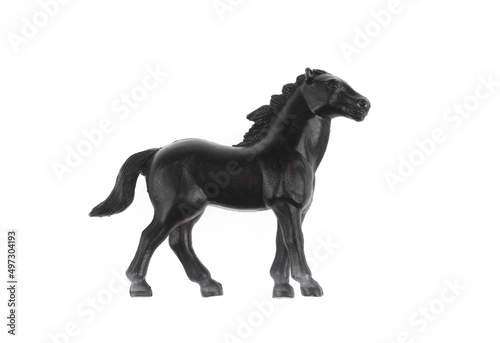 toy black horse isolated on white background