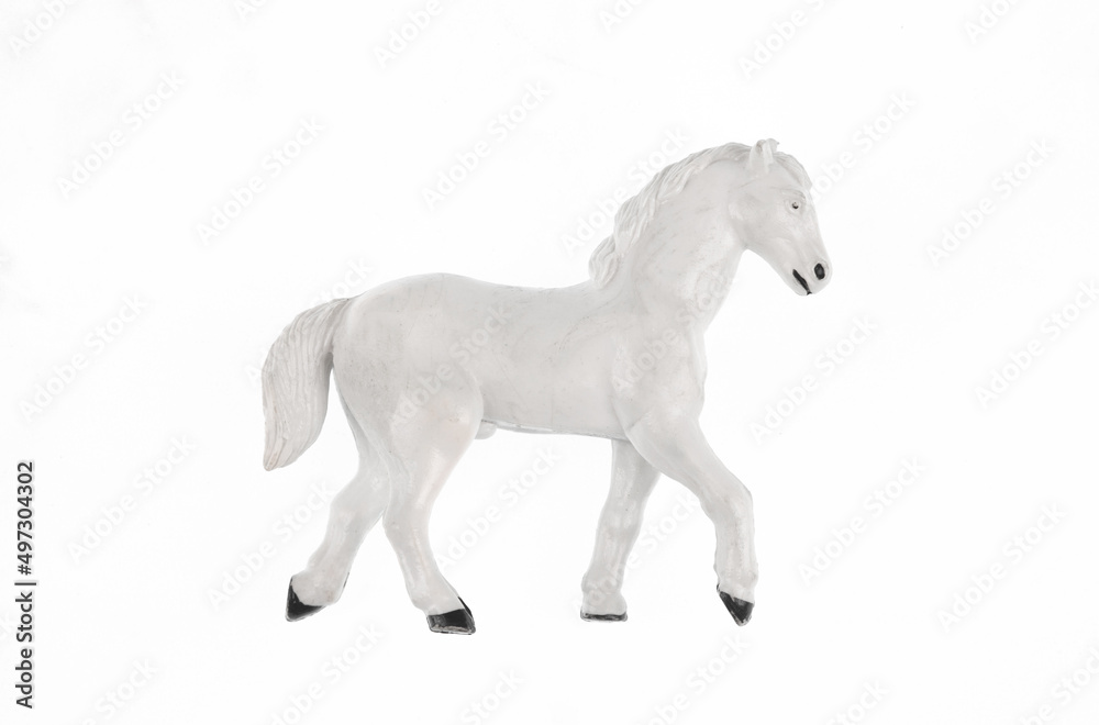 Fototapeta premium toy white horse isolated on white background
