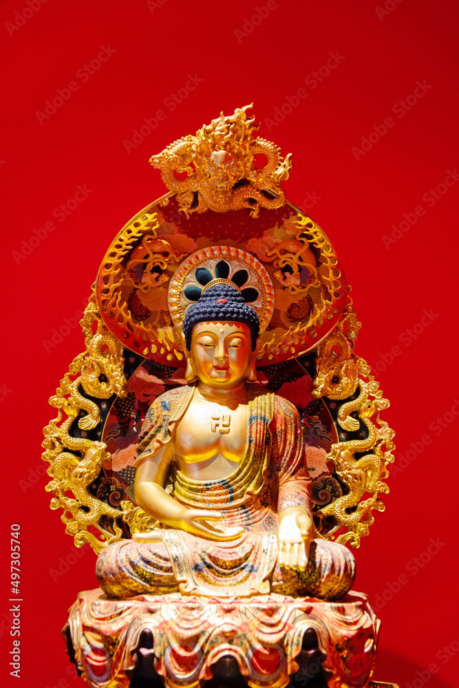 Close up of a golden Buddha statue