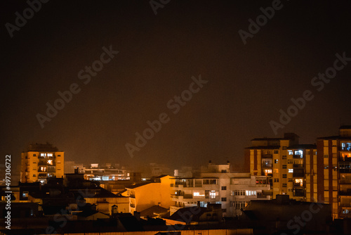 Night skyline of Fuengirola while Calima is on 