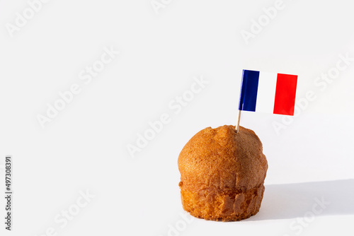 Homemade cupcake with France flag isolated on white background, copy space. National party. Bastille Day.