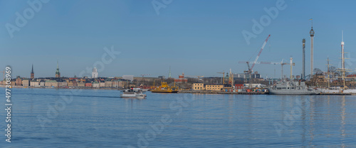 Panorama view with passenger commuting boat, old ferry, a sunny spring day in Stockholm  © Hans Baath