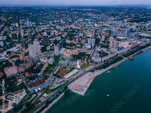 Fototapeta Naklejka Na Ścianę i Meble -  Dnipro, Ukraine. View of the central part of the city, the embankment of the Dnieper. Top view from a great height. Panoramic view of the city. Right bank of the city
