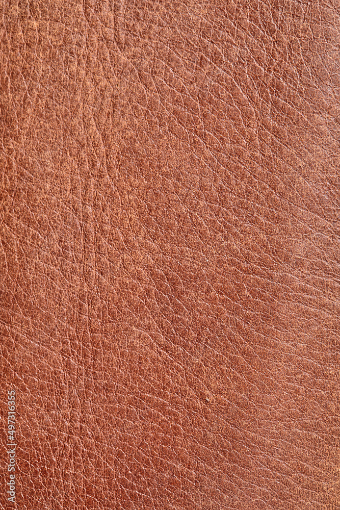 leather grunge background: a piece of light brown leather, with scuffs, spots, scars leather grunge background: a piece of light brown leather, with scuffs, spots, scars