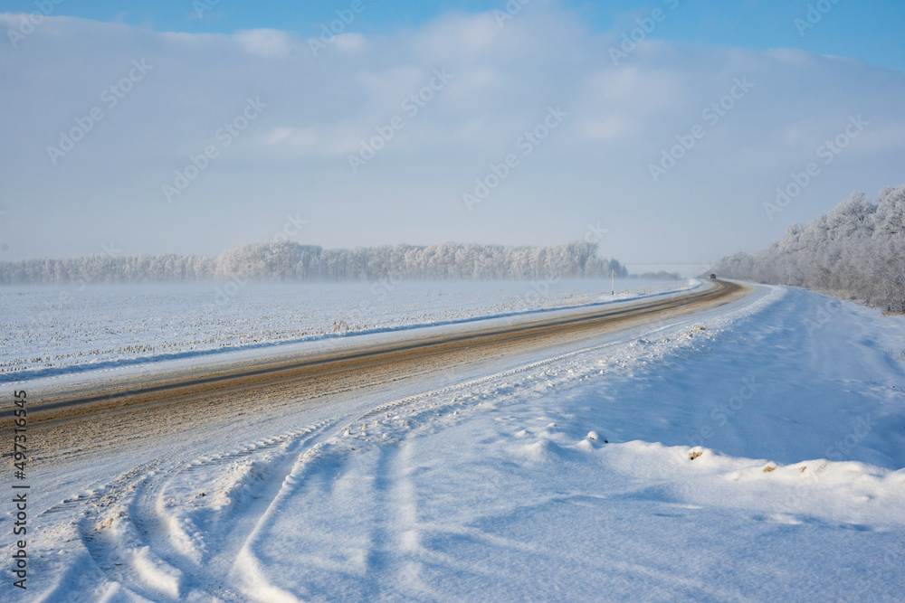 Winter snow landscape. Road in winter