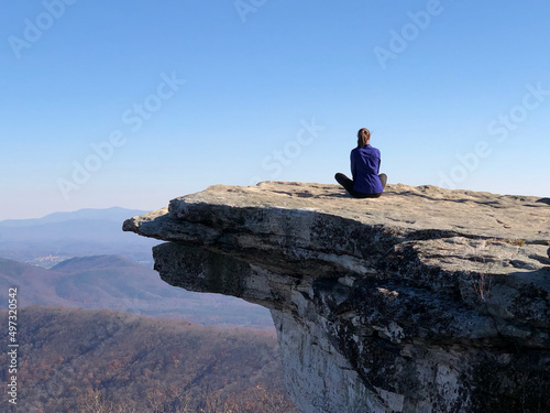 person on the top of a mountain