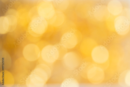 Many golden bokeh background. Abstract image for design. © vasanty