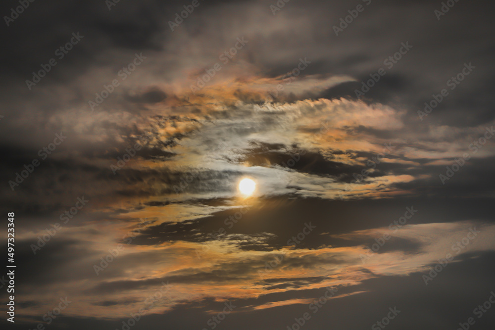 Fototapeta premium Sun in the clouds and close up