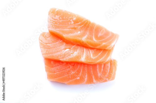 three pieces of raw salmon sushi sashimi isolated on white background raw fish