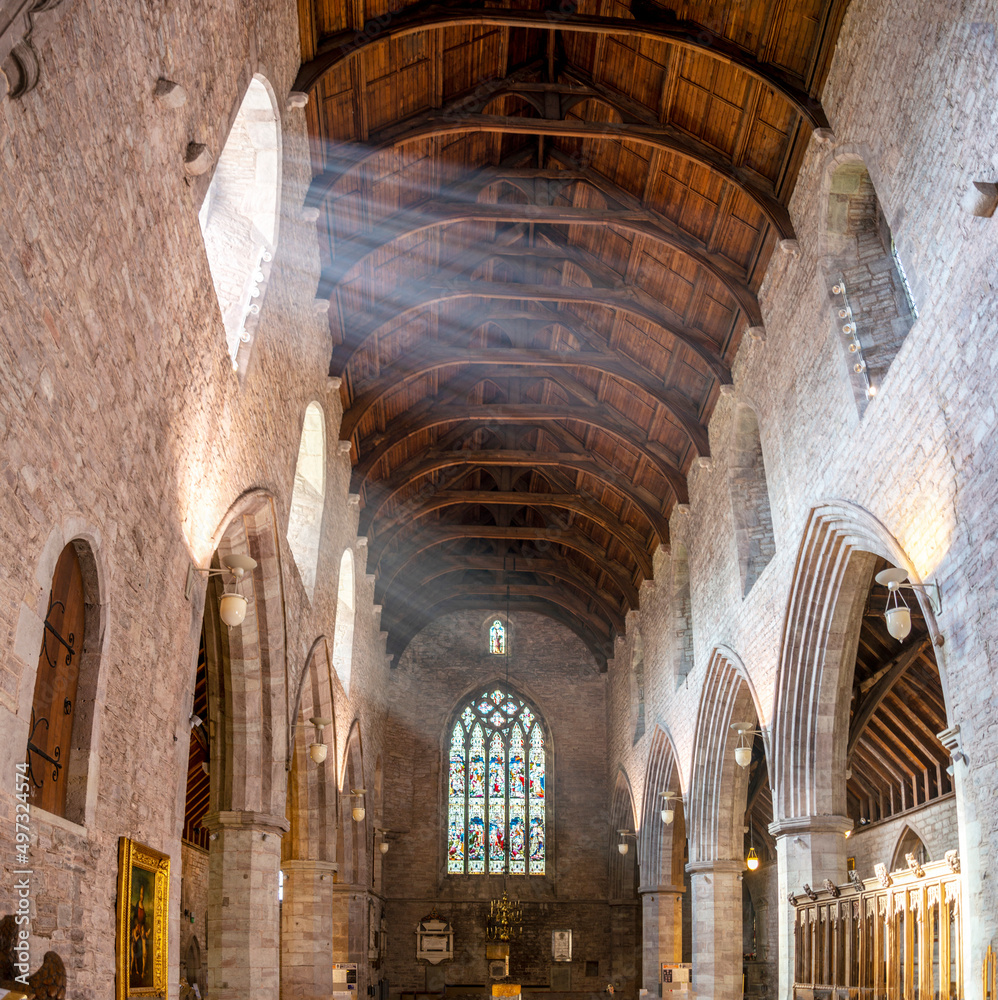 Shafts of sunlight streaming into the Interior of Brecon Cathedral Church,Brecon,Powys,Wales,UK.