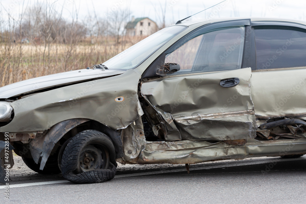 Damage to the car after a side collision with another car. Car accident on the road. Car insurance. Damage to the car after a side collision with another car. Car accident on the road. Car insurance.